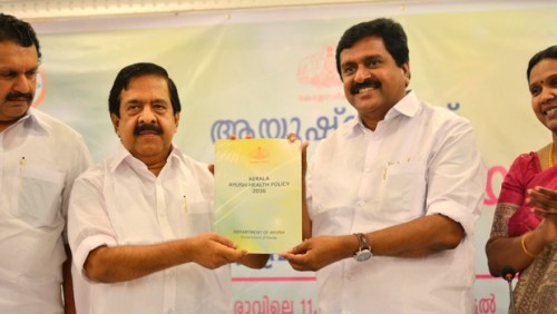 Home Minister Ramesh Chennithala releasing the Kerala Ayush Health Policy 2016 by handing over a copy to Health Minister V S Sivakumar in Thiruvananthapuram on Thursday. K Muraleedharan MLA and M Beena, Secretary, Department of Ayush, are also seen | Manu R Mavelil 