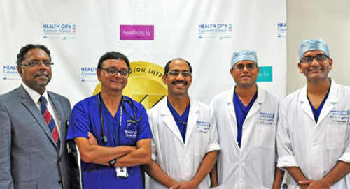 The Health City Team from left: Dr. Chandy Abraham, Dr. Ravi Kishore, Dr. Binoy Chattuparambil, Dr. Dhruva Krishnan and Dr. Sumit Modi. Photo Health City Cayman Islands 