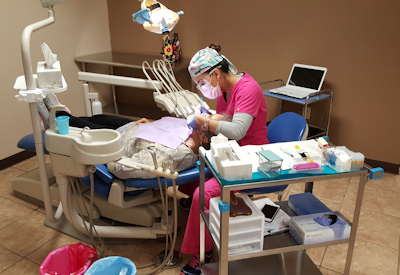 A dentist in Palomas, Mexico, working on a patient. Image courtesy of Beyond Borders Dental. 